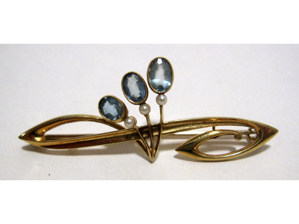 Appraisal: Fifteen carat gold blue topaz and seed pearl set bar