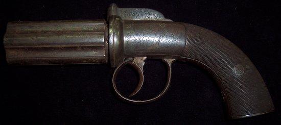 Appraisal: A pepper pot six chamber percussion cap revolver with engraved