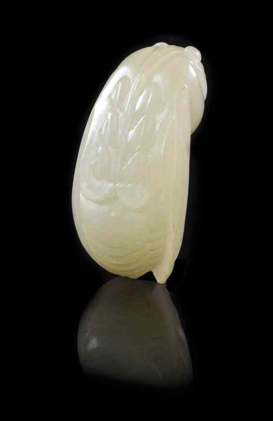 Appraisal: A Large Jade Carving of a Cicada of celadon colored