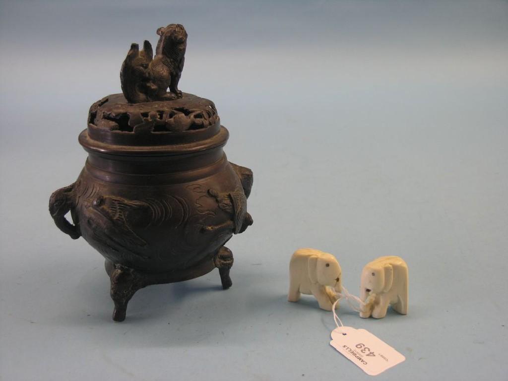 Appraisal: A late th century Japanese patinated bronze vase and cover