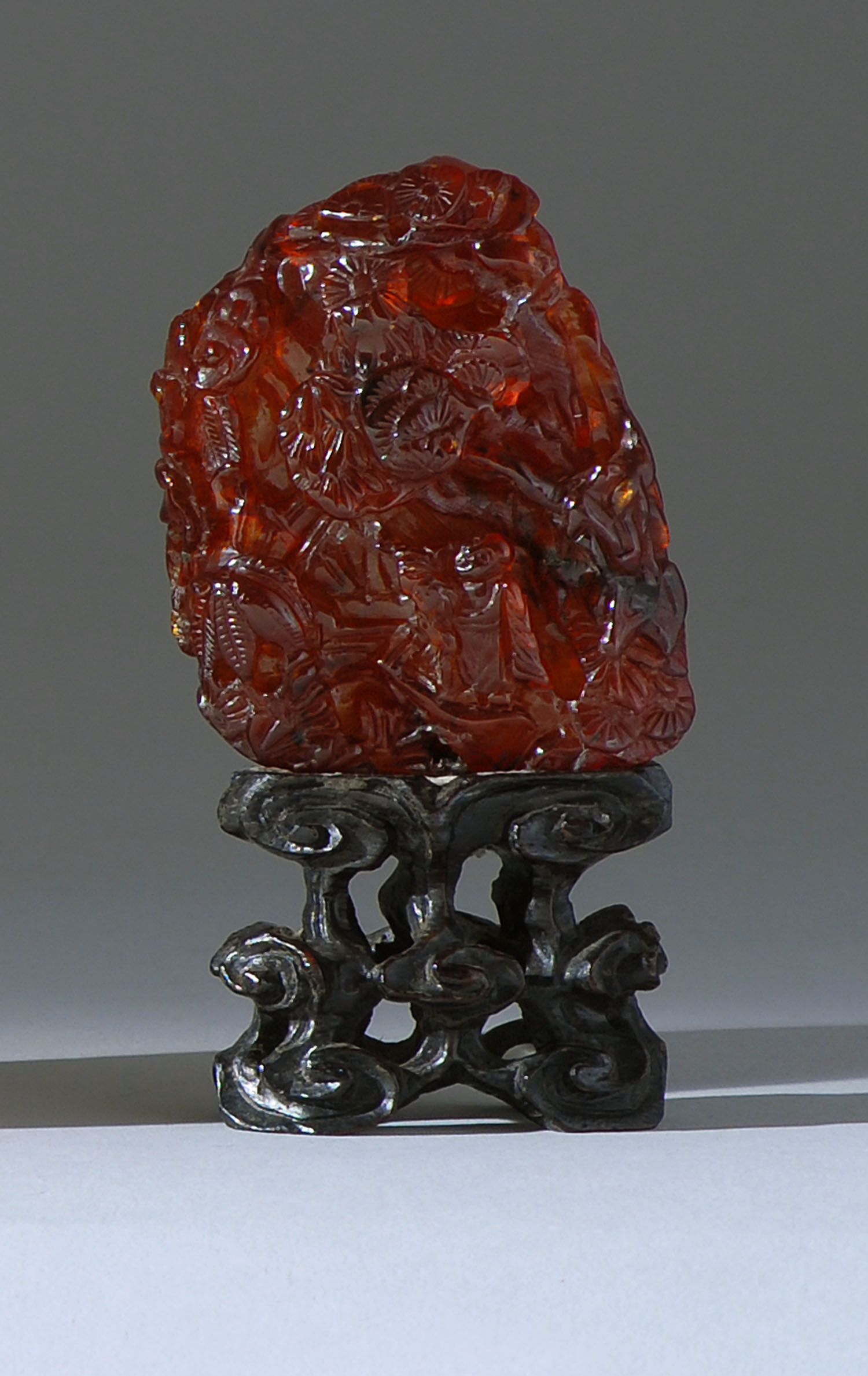 Appraisal: AMBER MINIATURE MOUNTAIN th CenturyWith figural landscape carving Height cm