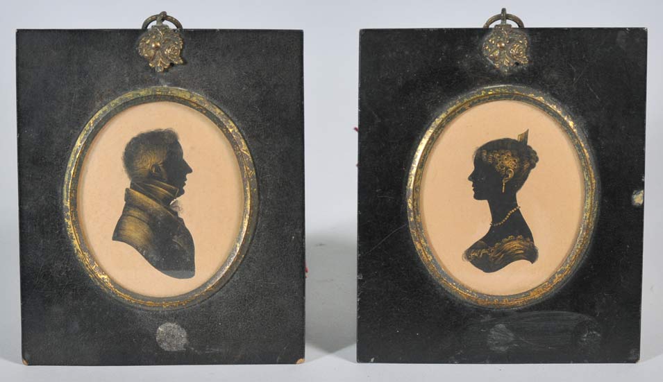 Appraisal: Pair of Painted Silhouette Profiles with gilt highlights overall x