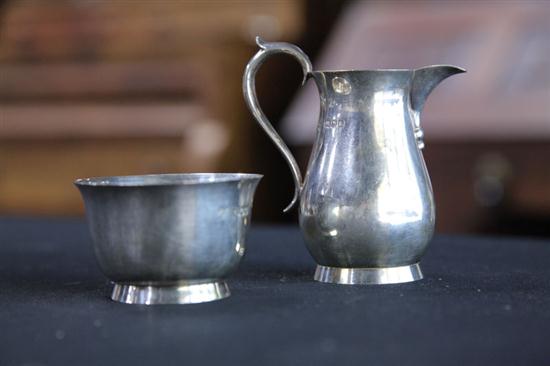 Appraisal: ENGLISH STERLING CREAMER AND SUGAR SET Cased set retailed by