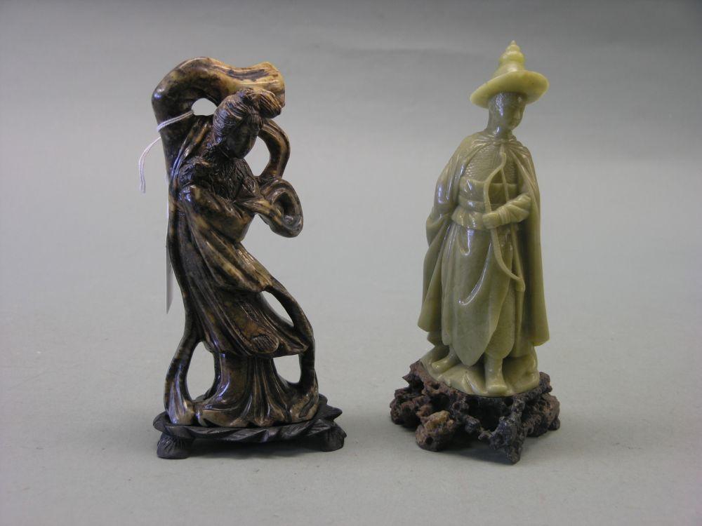 Appraisal: Two Chinese carved soapstone figures each on carved plinth in