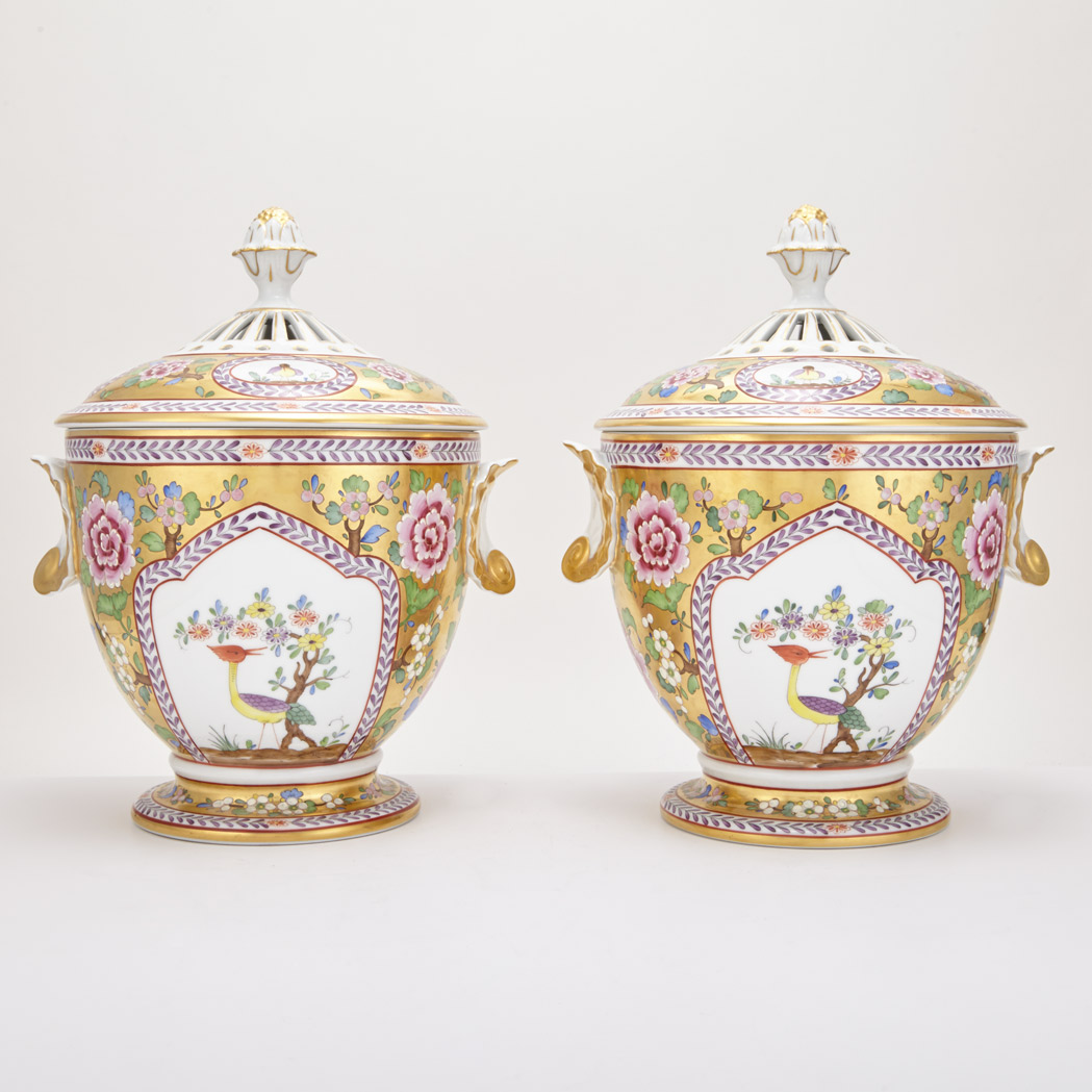 Appraisal: Pair of Dresden Gilt and Polychrome Decorated Porcelain Potpourri Urns