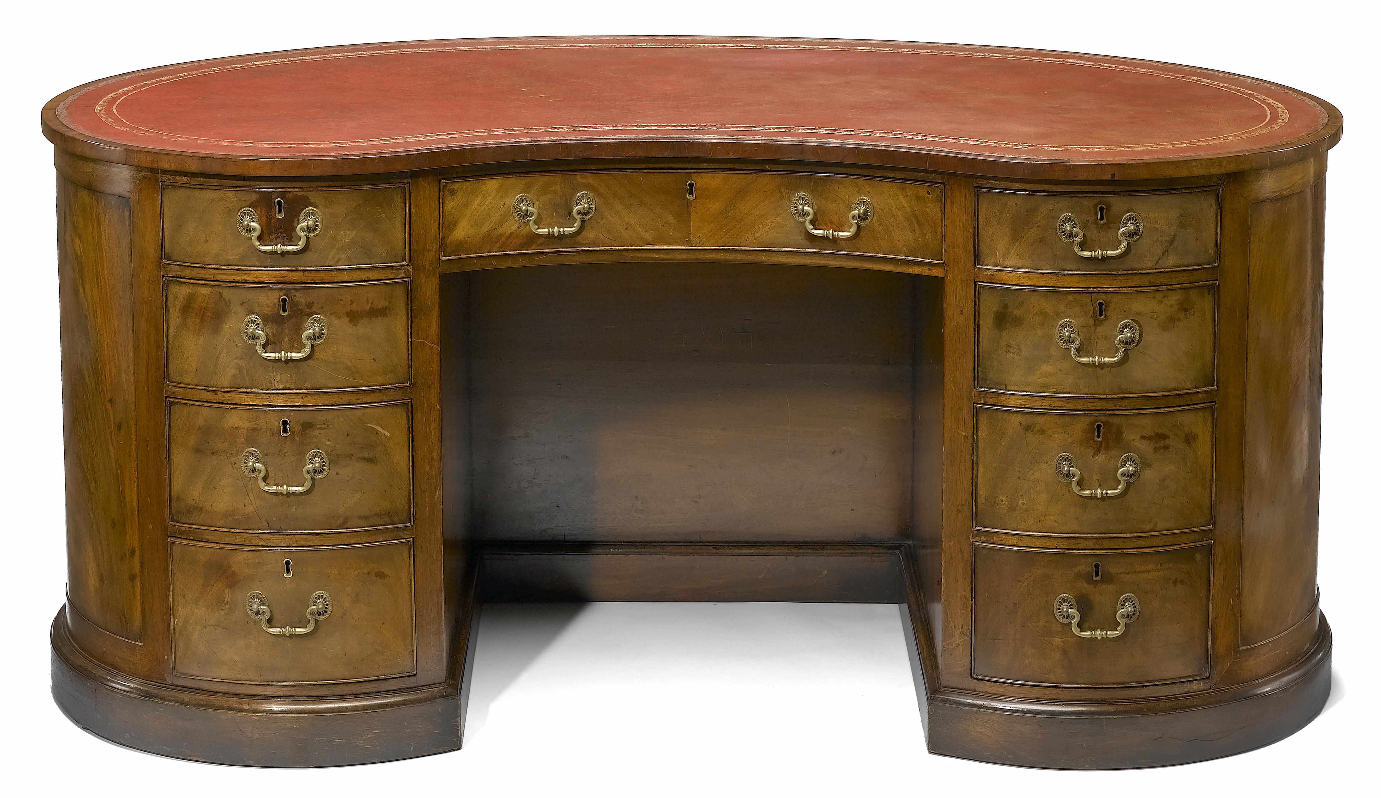 Appraisal: A George III style mahogany desk circa Of kidney shaped