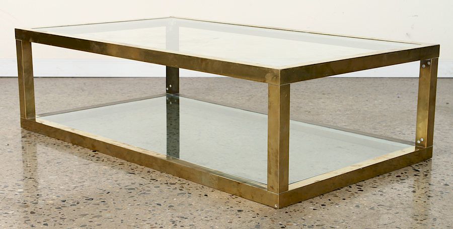 Appraisal: RECTANGULAR GLASS TOP COFFEE TABLE CIRCA A rectangular glass top