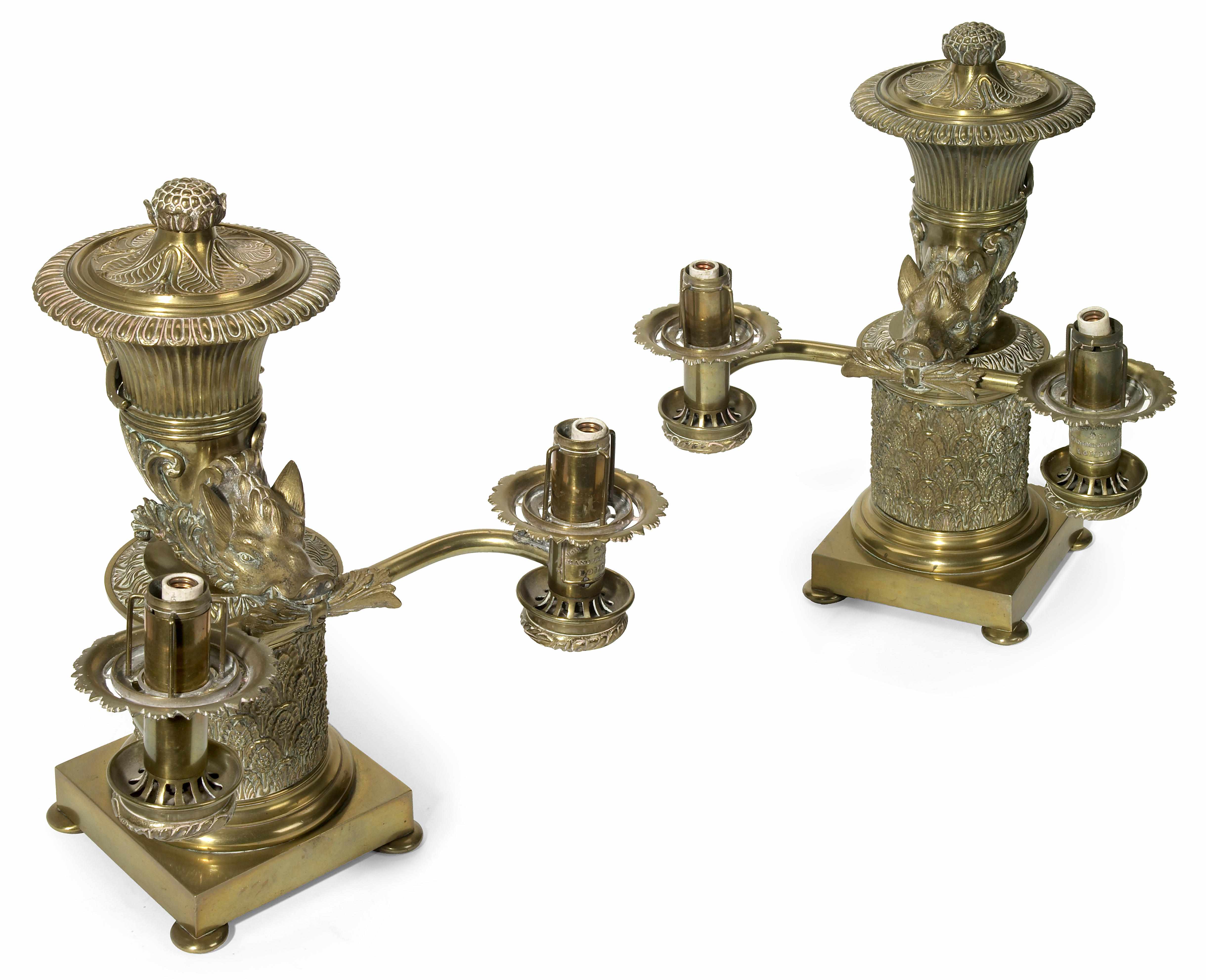 Appraisal: A pair of George IV gilt brass two light argand