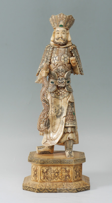 Appraisal: CHINESE BONE CLAD WARRIOR Figure of a warrior holding a