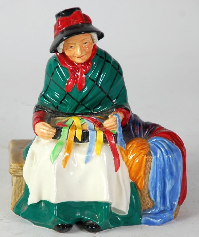 Appraisal: ROYAL DOULTON CHINA FIGURE 'Silk and Ribbons' HN cm high