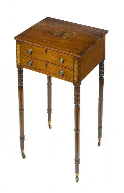 Appraisal: A REGENCY MAHOGANY WORK TABLE the lid with two central