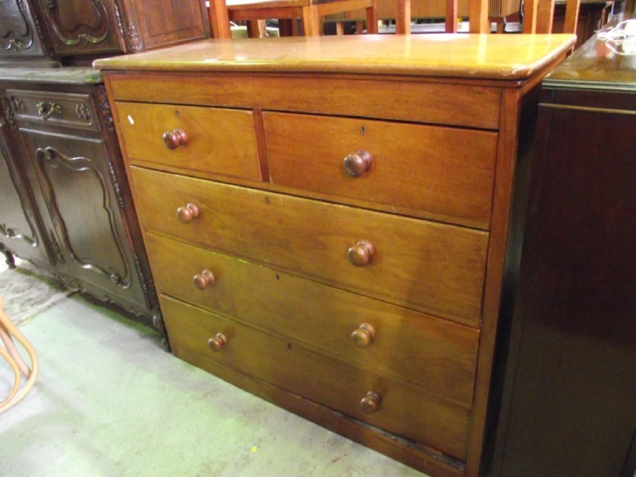 Appraisal: A th century mahogany bedroom chest of three long and