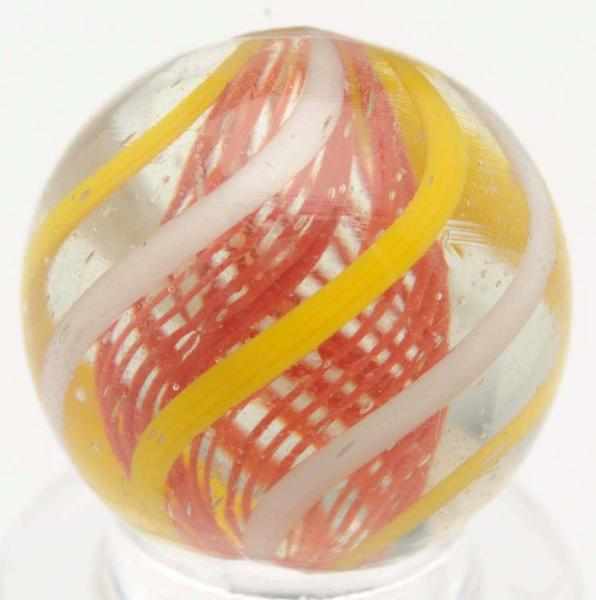 Appraisal: Red Latticino Swirl Marble Red latticino core with outer alternating