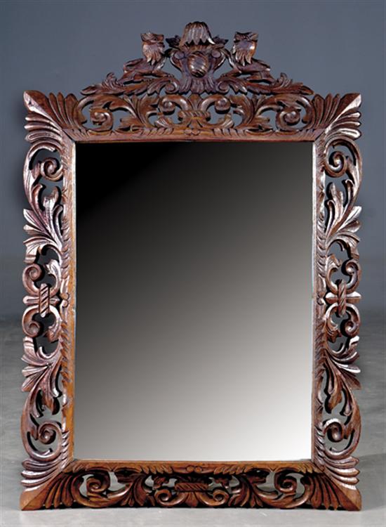 Appraisal: Continental carved oak overmantel mirror circa heavy frame carved with