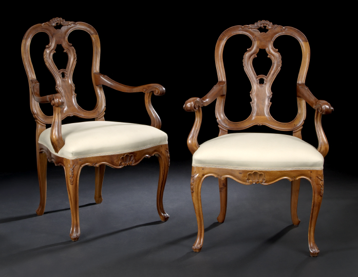 Appraisal: Pair of Italian Fruitwood Fauteuils each with a shaped crest