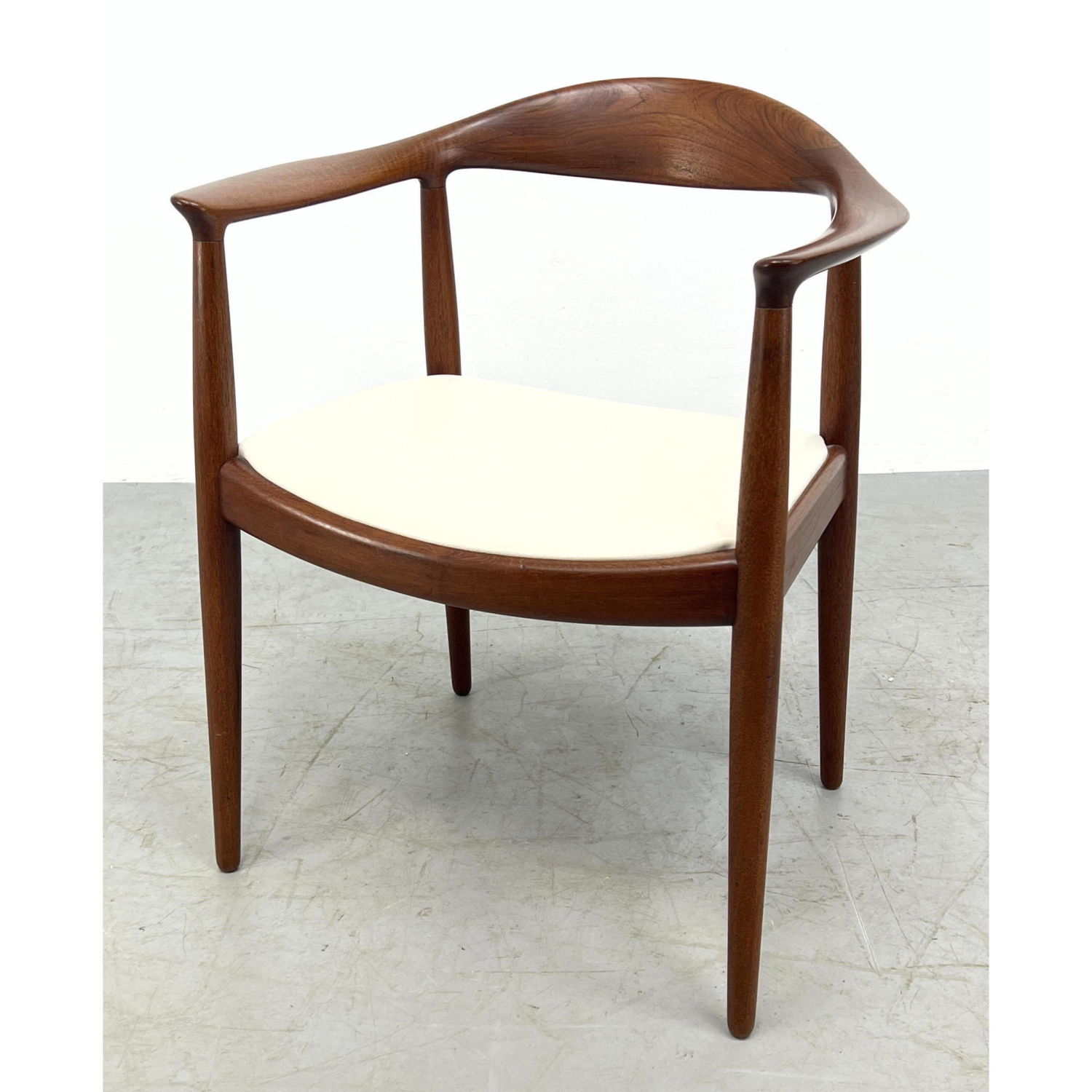 Appraisal: HANS WEGNER Teak and Leather Chair Unmarked Dimensions H inches