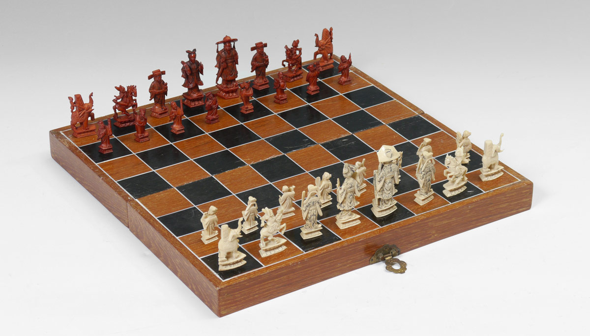 Appraisal: CARVED IVORY CHESS SET IN CASE Complete carved ivory chess