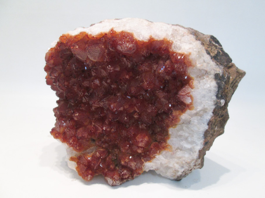 Appraisal: CITRINE GEODE inverse exposure having deep amber points Dimensions L