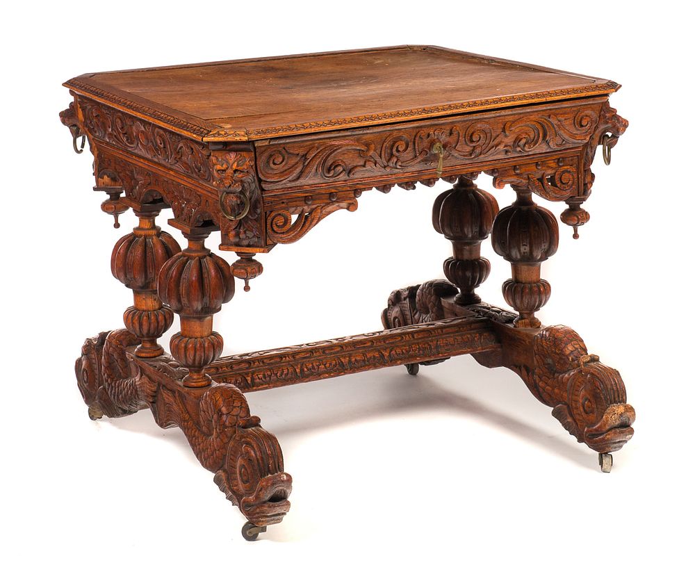 Appraisal: Highly Carved Oak Dolphin Library Table Highly Carved Oak Dolphin