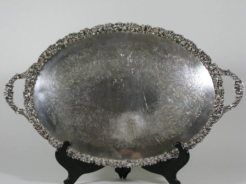 Appraisal: Silverplate Waiter English th c oval form cast and applied