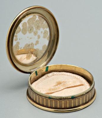 Appraisal: Tiffany gold compact lid with floral engraved borders and wreath