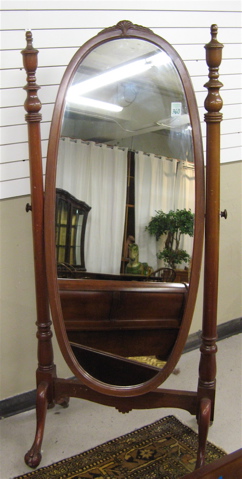 Appraisal: VICTORIAN STYLE MAHOGANY CHEVAL MIRROR American th century the oval