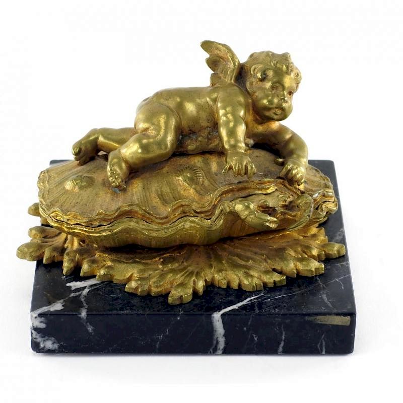 Appraisal: Gilt Bronze Putti Box early th century hinged lid in