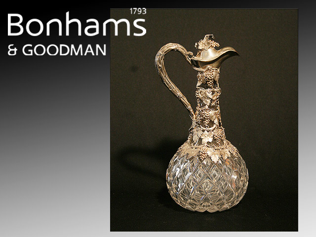 Appraisal: A Victorian silver mounted claret jug in diamond cut crystal