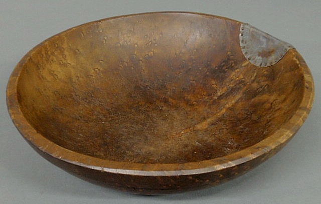 Appraisal: Burl walnut bowl th c with hammered tin repair h