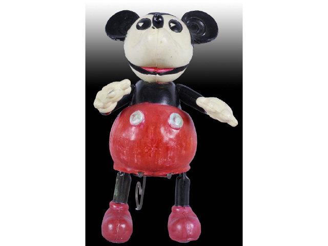 Appraisal: Celluloid Walt Disney Rambling Mickey Mouse Toy Description Wind-up Made