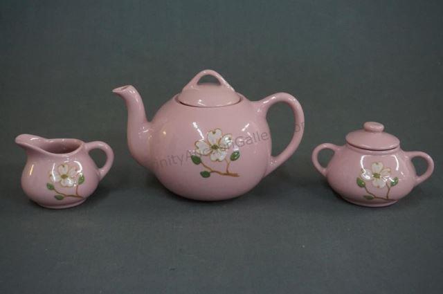 Appraisal: Pigeon Forge Pottery Dogwood Teapot Cream Sugar ca 's Pigeon