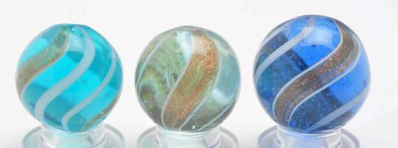 Appraisal: Lot of Banded Lutz Marbles Description Includes one transparent light