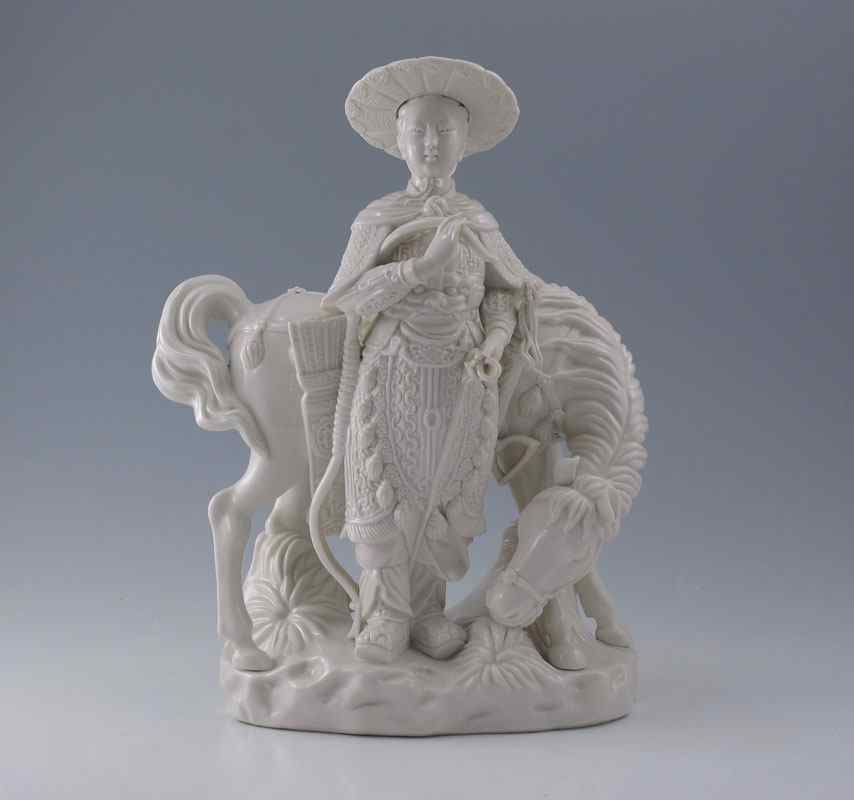 Appraisal: CHINESE BLANC DE CHINE FIGURAL GROUP Well dressed figure and