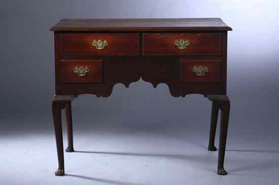 Appraisal: ENGLISH QUEEN ANNE STYLE OAK LOWBOY th century having restoration