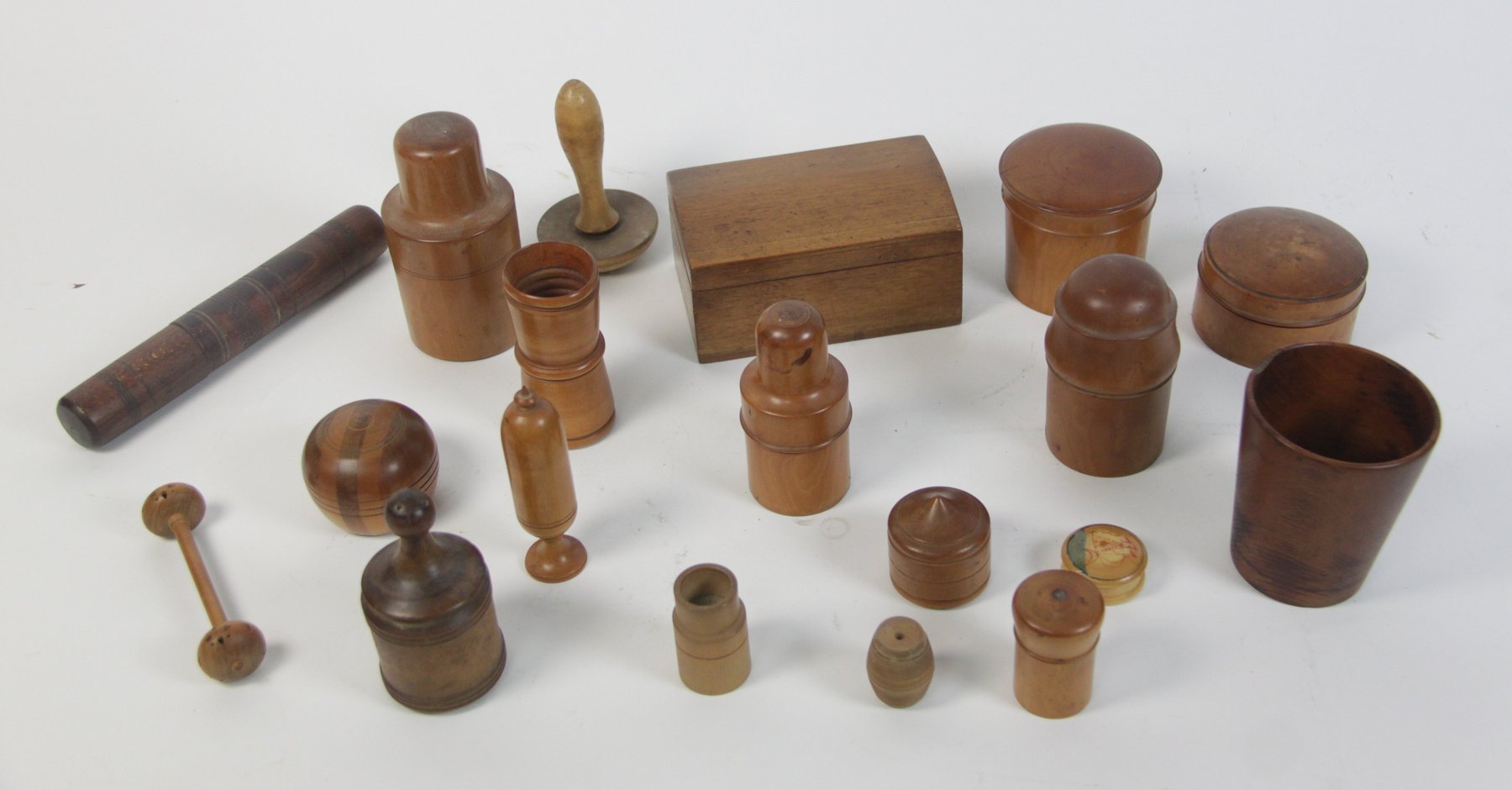 Appraisal: A collection of treen including bottle cases wool winders boxes