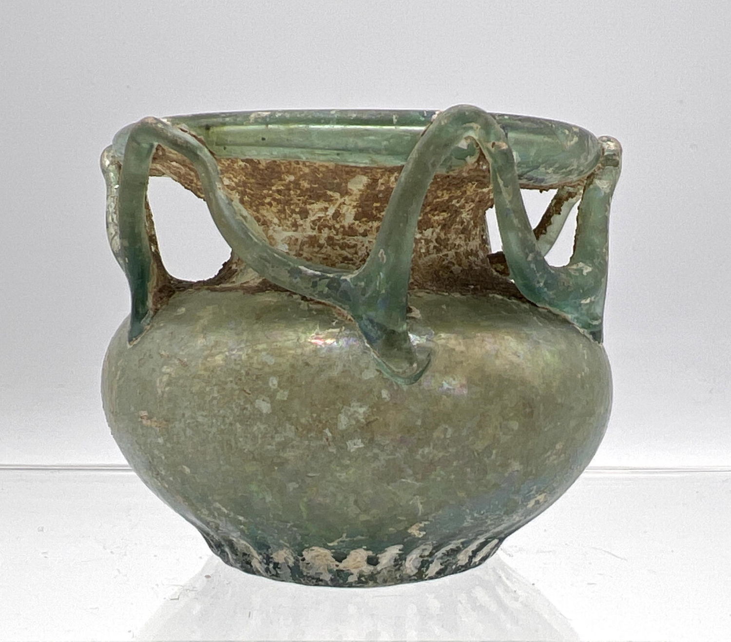 Appraisal: Green Squat vase with loop decoration Ancient Roman glass Dimensions