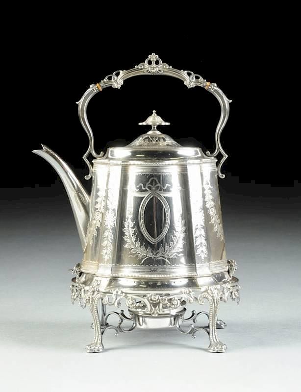 Appraisal: A VICTORIAN SILVER PLATED TEAPOT ON STAND WITH BURNER MARTIN