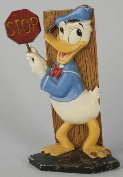 Appraisal: Cast Iron Walt Disney Donald Duck Doorstop Description American Original