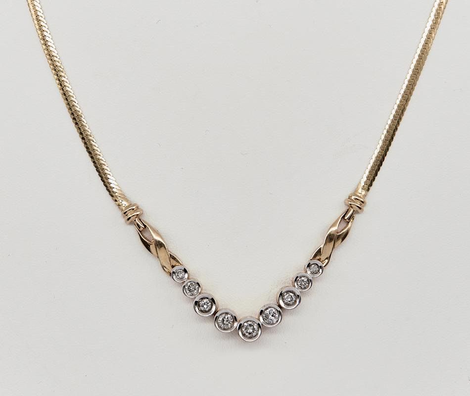 Appraisal: k Yellow gold and diamond necklace k Yellow gold and