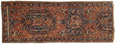 Appraisal: Ushak long rug central medallions on varying brick red field