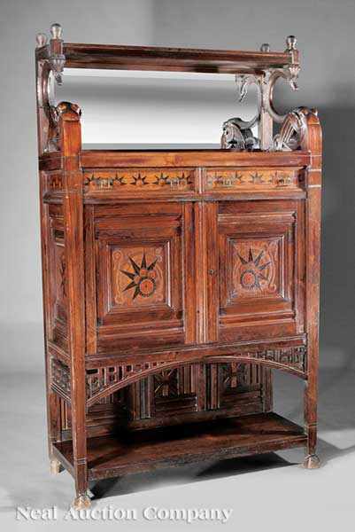 Appraisal: An American Aesthetic Carved Rosewood and Inlaid Side Cabinet in