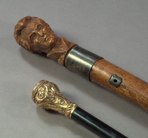 Appraisal: Good American Silver- and Bronze-Mounted Carved Hardwood Walking Stick with