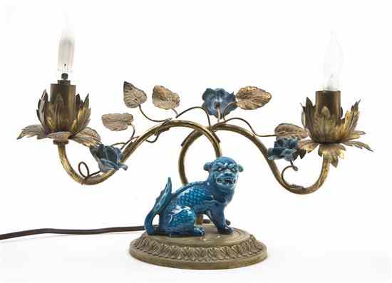 Appraisal: A French Gilt Bronze Lamp having two scrolling foliate arms