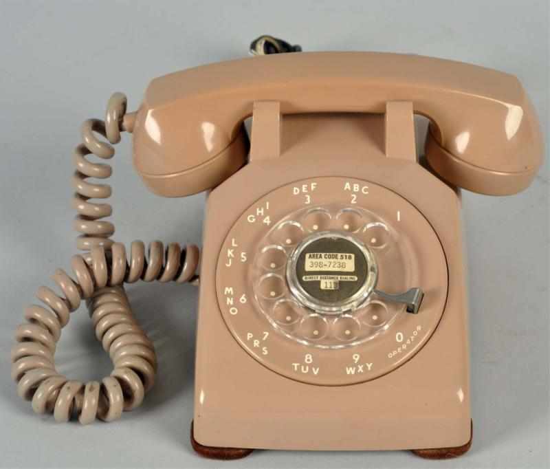 Appraisal: Western Electric Dark Beige Cradle Telephone Soft plastic shell marked