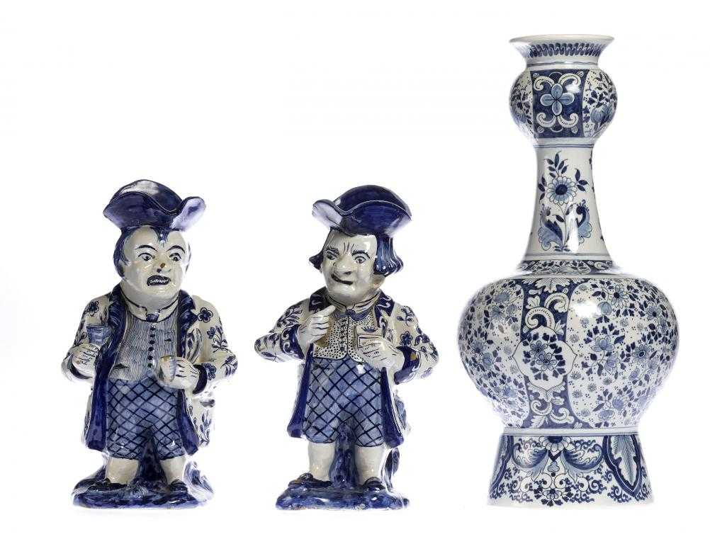 Appraisal: TWO SIMILAR DUTCH DELFTWARE TOBY JUGS one a toper the