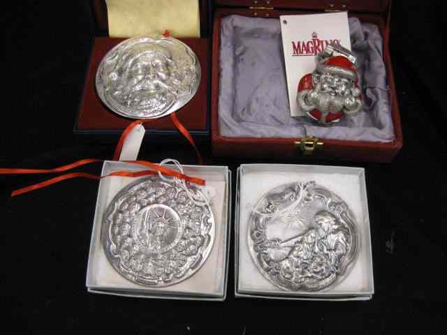 Appraisal: Sterling Silver Christmas Ornamentsby Scultpture Workshop Designs including ''Forever Santa''