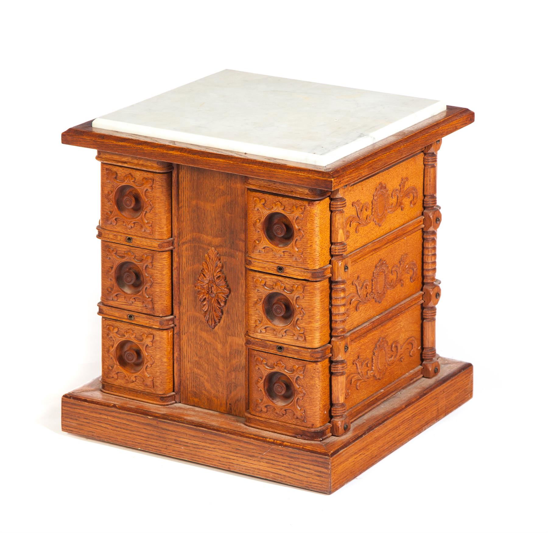 Appraisal: SMALL SIX-DRAWER STAND WITH MARBLE TOP American ca oak Sides