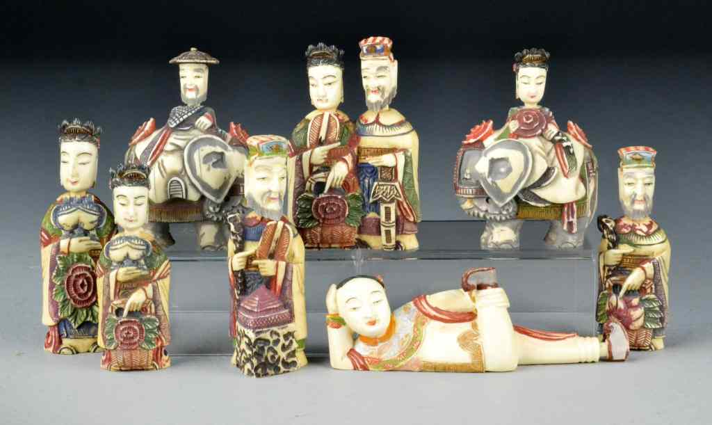 Appraisal: Chinese Polychrome Painted Ivory Snuff BottlesCarved to depict figures and