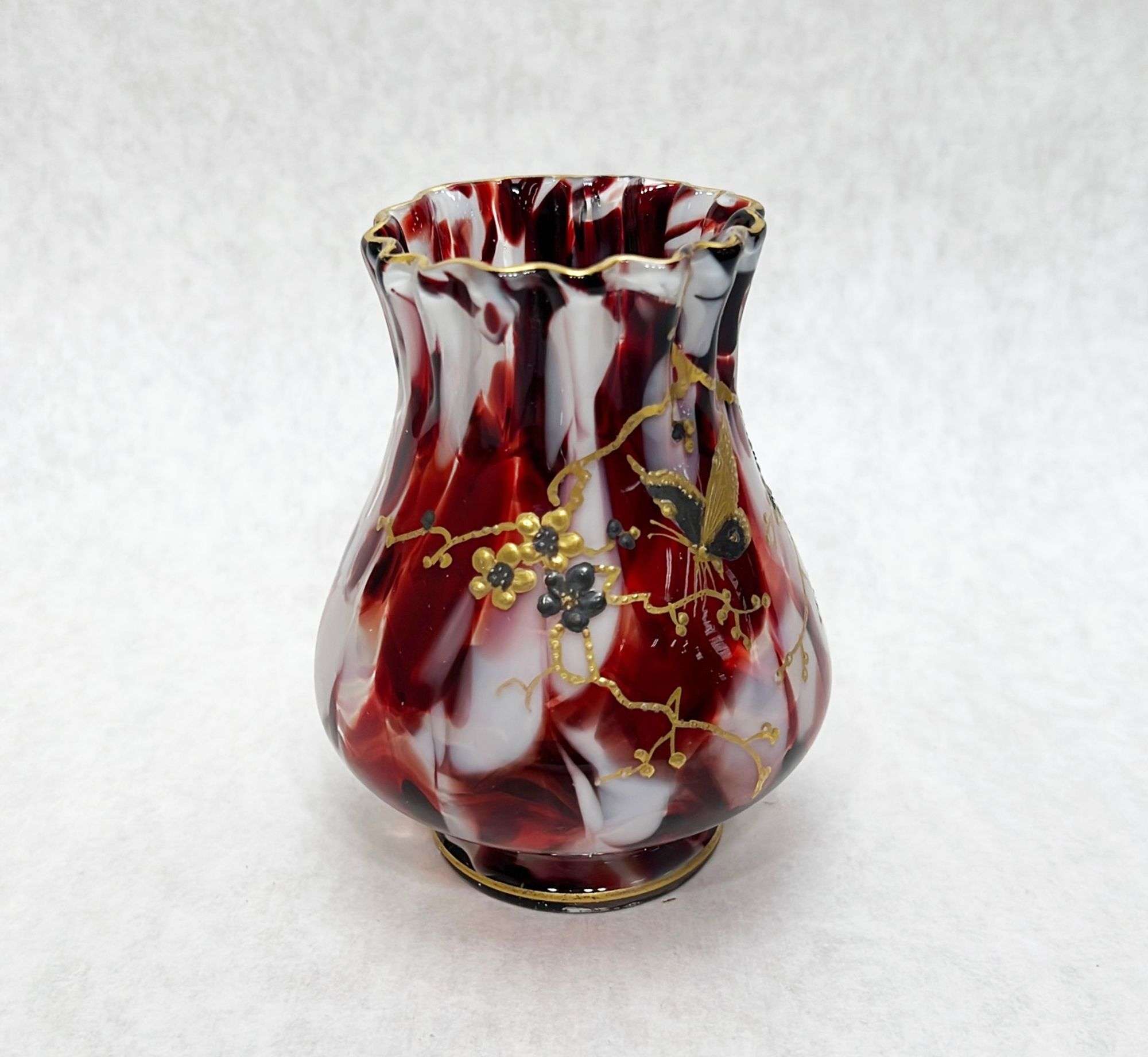 Appraisal: Victorian Art Glass Vase with Enameled Butterfly tall at widest