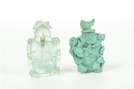 Appraisal: TWO CARVED SNUFF BOTTLES China th century Green quartz with